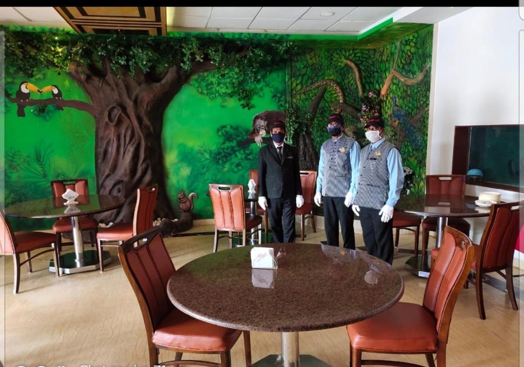 Hotel Sharada International أودوبي المظهر الخارجي الصورة