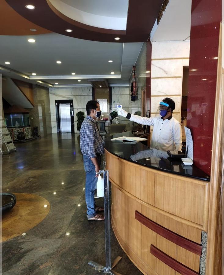 Hotel Sharada International أودوبي المظهر الخارجي الصورة