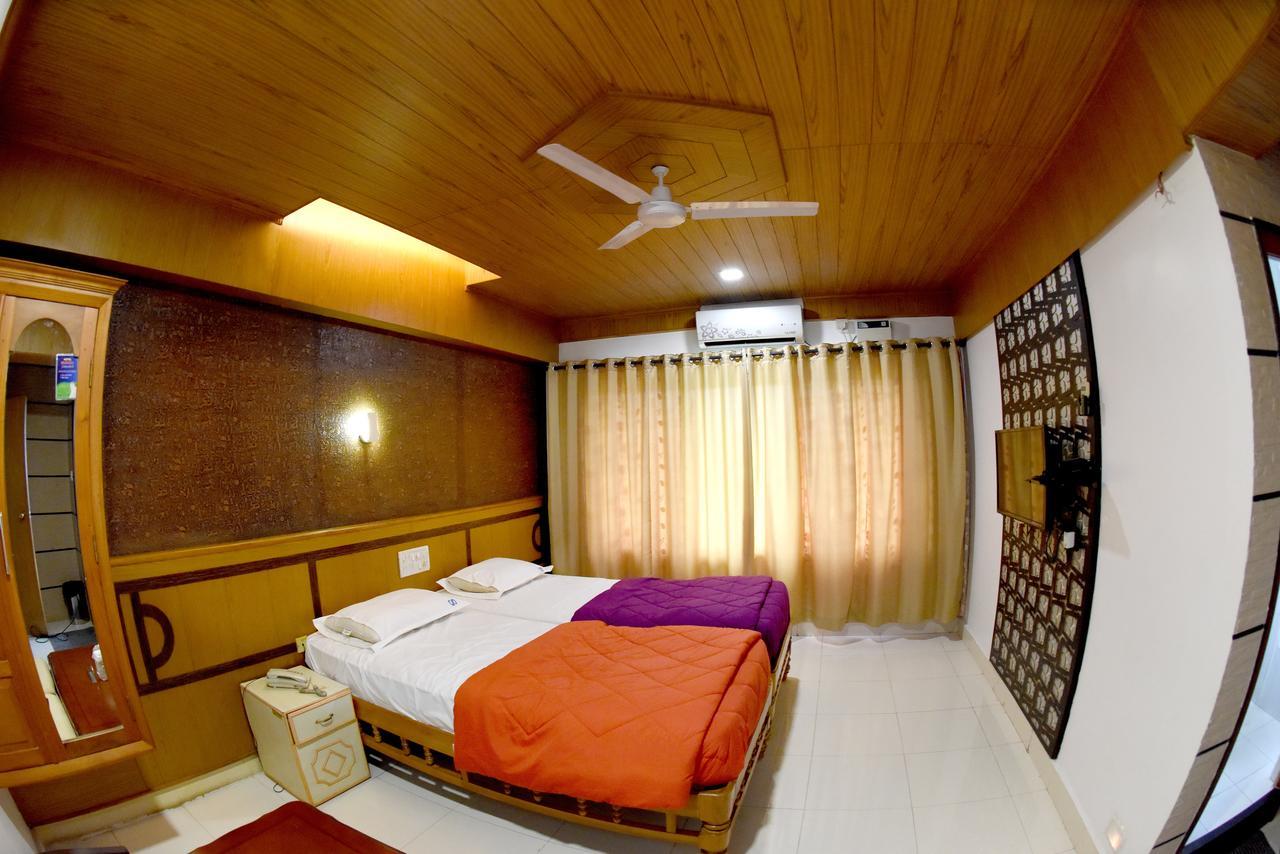 Hotel Sharada International أودوبي المظهر الخارجي الصورة