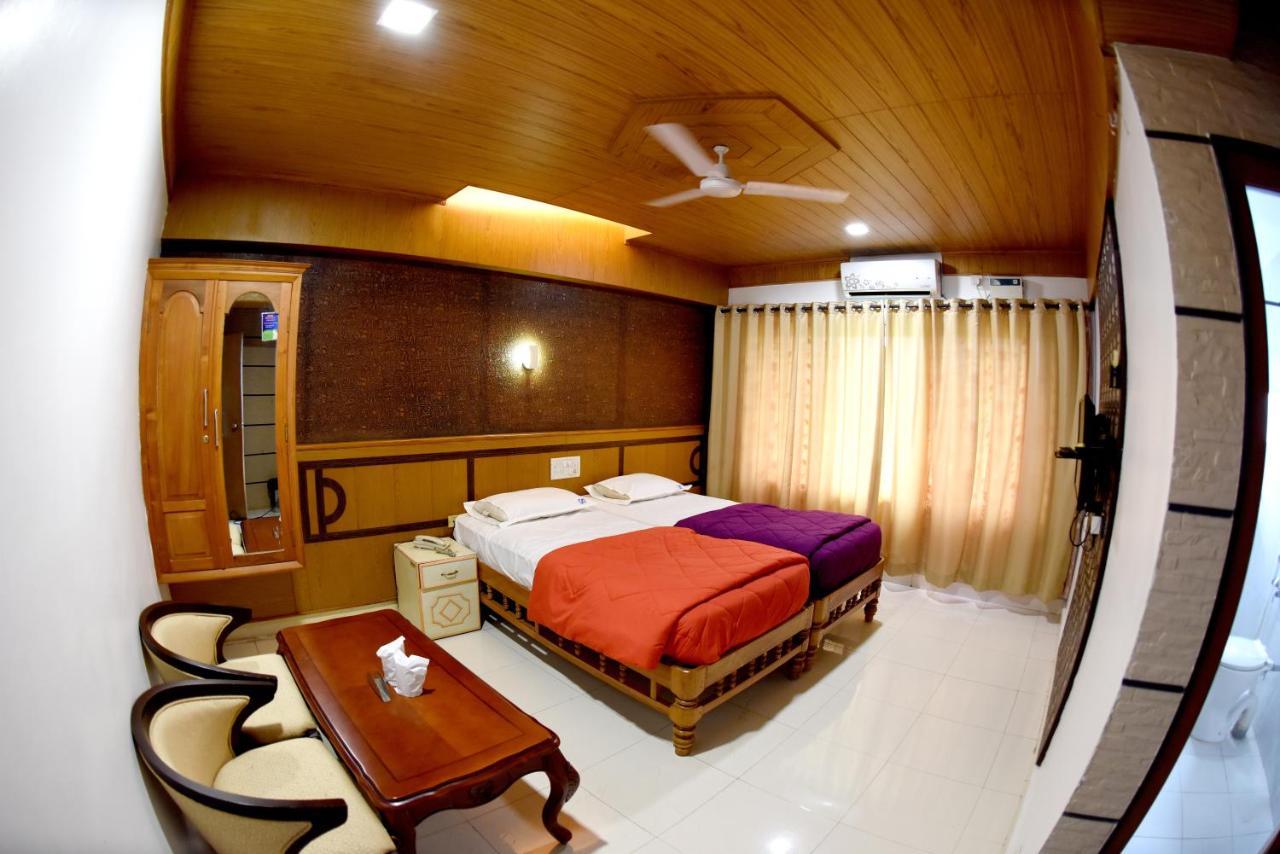 Hotel Sharada International أودوبي المظهر الخارجي الصورة