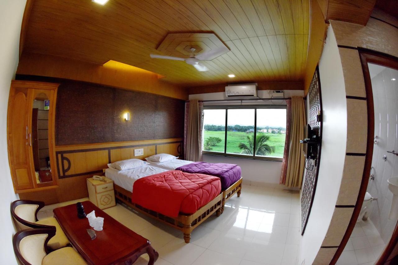 Hotel Sharada International أودوبي المظهر الخارجي الصورة