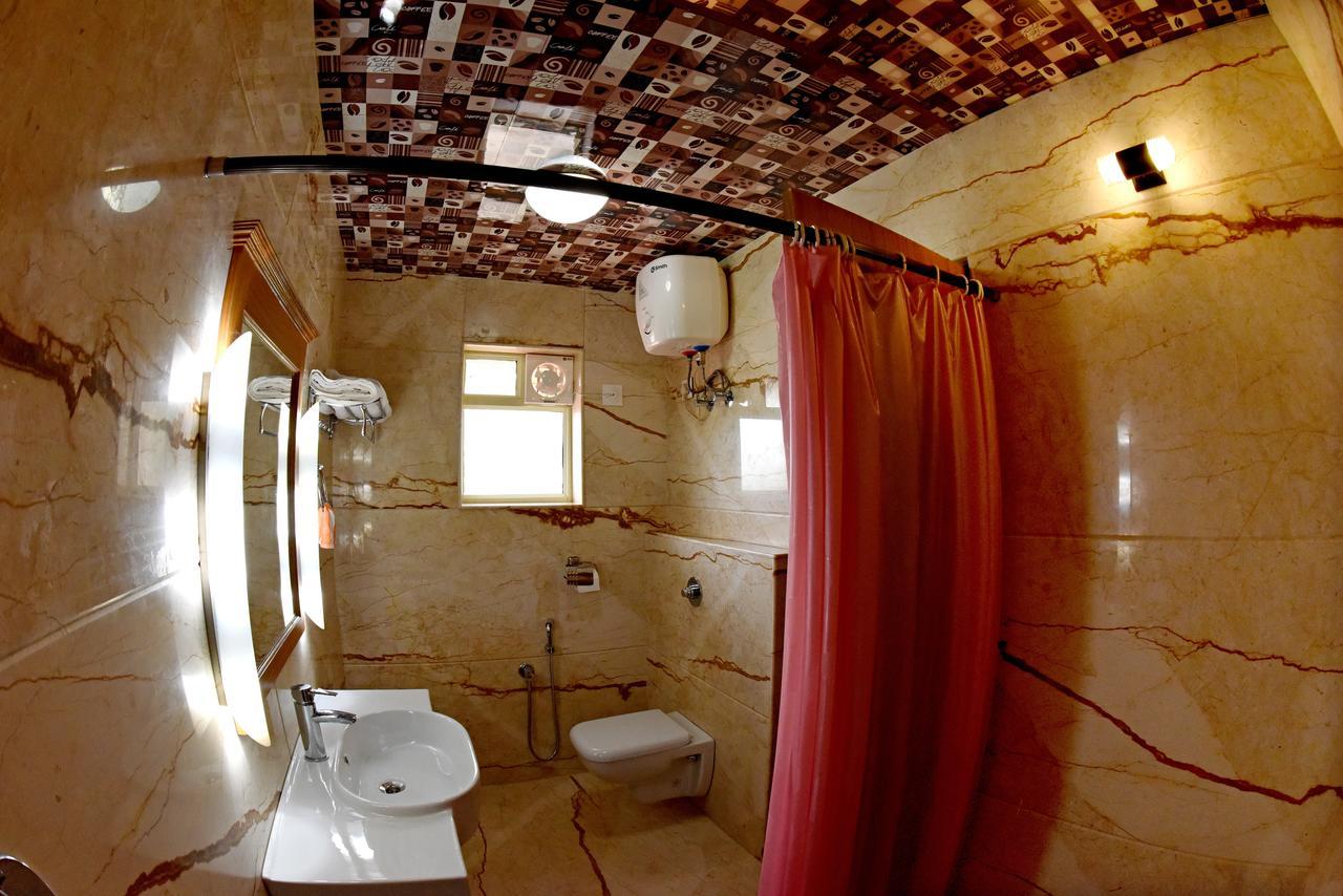 Hotel Sharada International أودوبي المظهر الخارجي الصورة