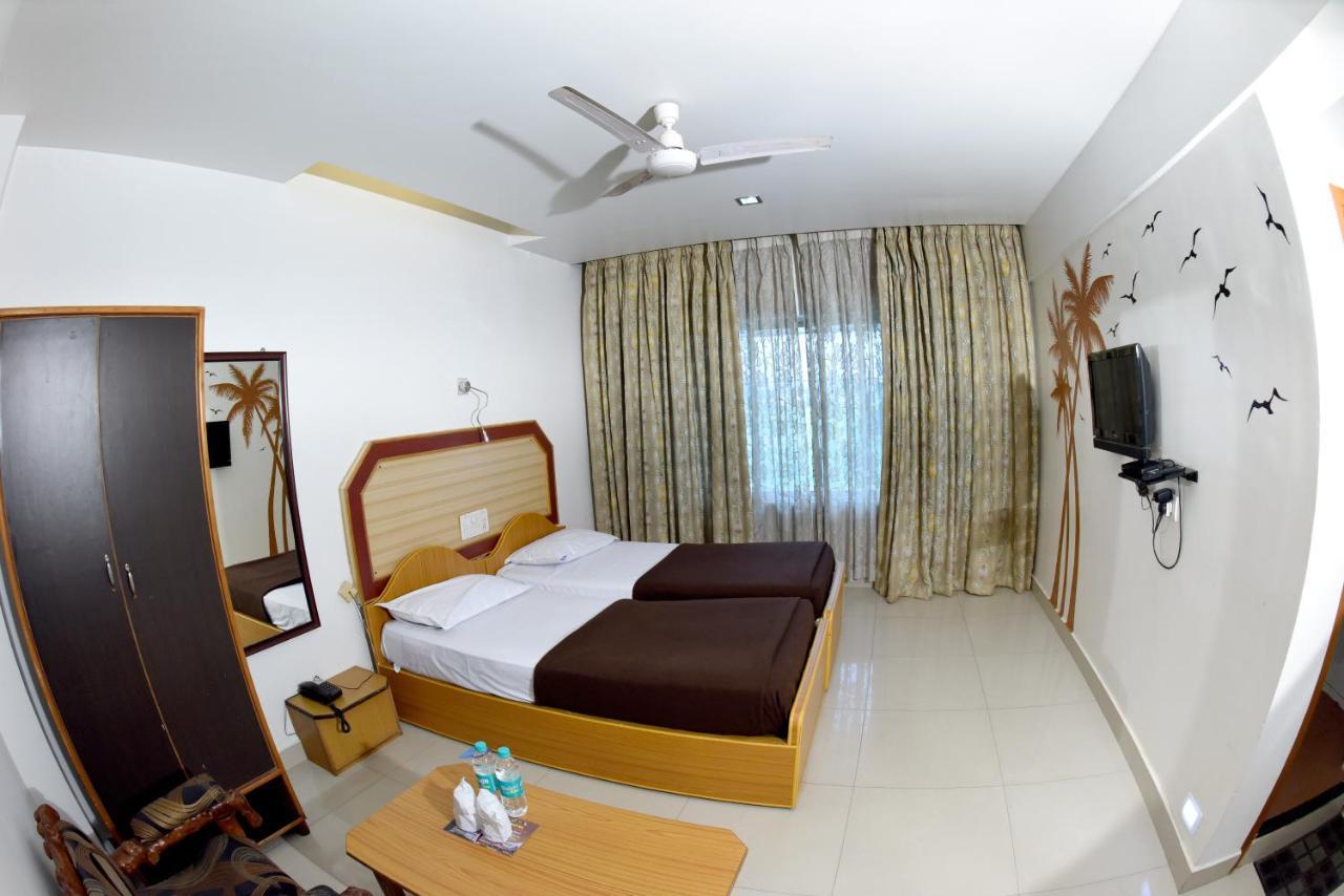Hotel Sharada International أودوبي المظهر الخارجي الصورة
