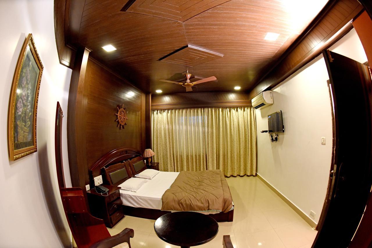 Hotel Sharada International أودوبي المظهر الخارجي الصورة
