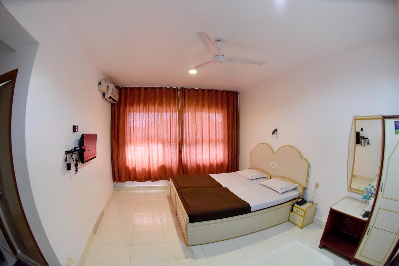 Hotel Sharada International أودوبي المظهر الخارجي الصورة