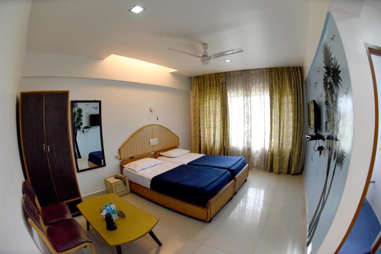 Hotel Sharada International أودوبي المظهر الخارجي الصورة