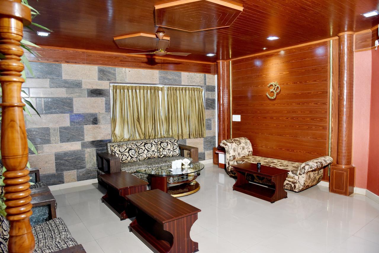 Hotel Sharada International أودوبي المظهر الخارجي الصورة